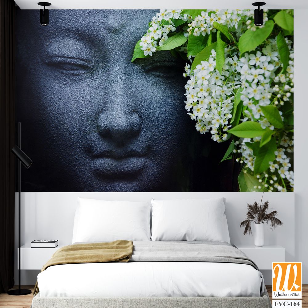 Black stone face of Buddha, adorned with flowers Wallpaper [WP-FVC-164]